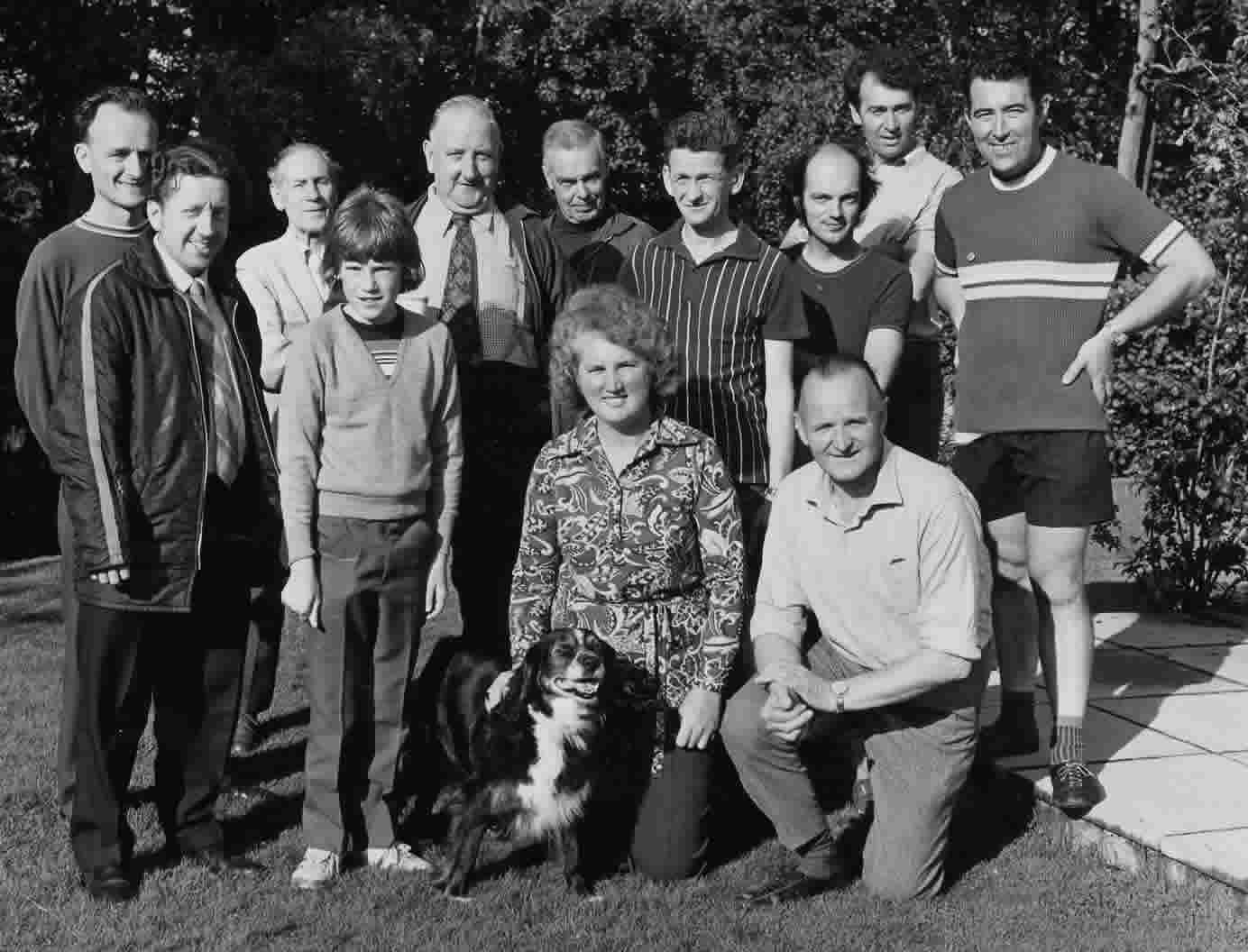 Club Tea at Pat Hill's. L-R: Peter Price, Alan Capon, Reg Fuller (a founder member), ?? Wilkins, Gordon Cronk, ??, Laurie Broad, ??, Ted Hill, ??. Kneeling - Pat Hill and Aubrey Ring
